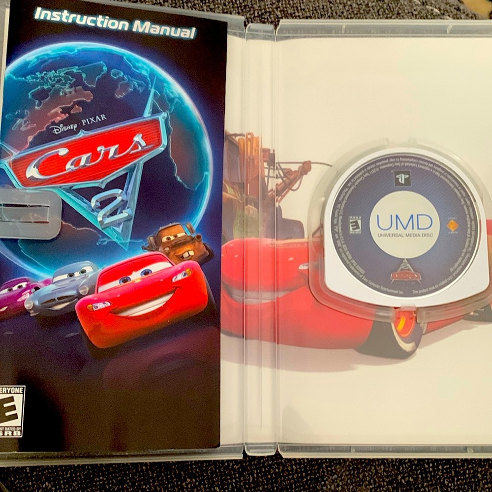 Cars 2 PlayStation PSP game disk.